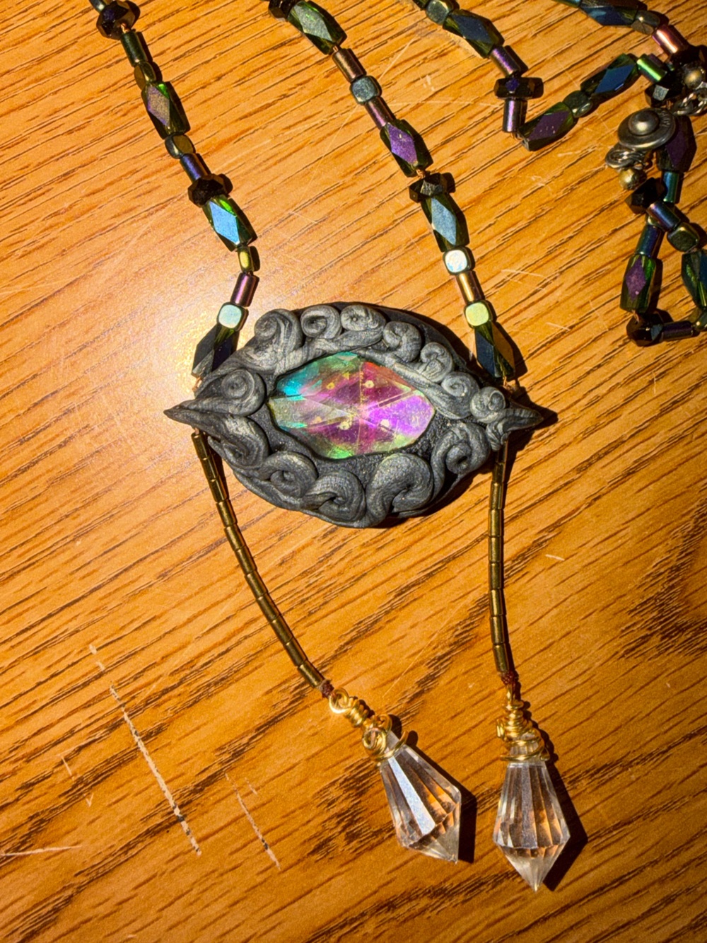 Iridescent Multicolor Crystal Pendant Necklace with Ornate Frame